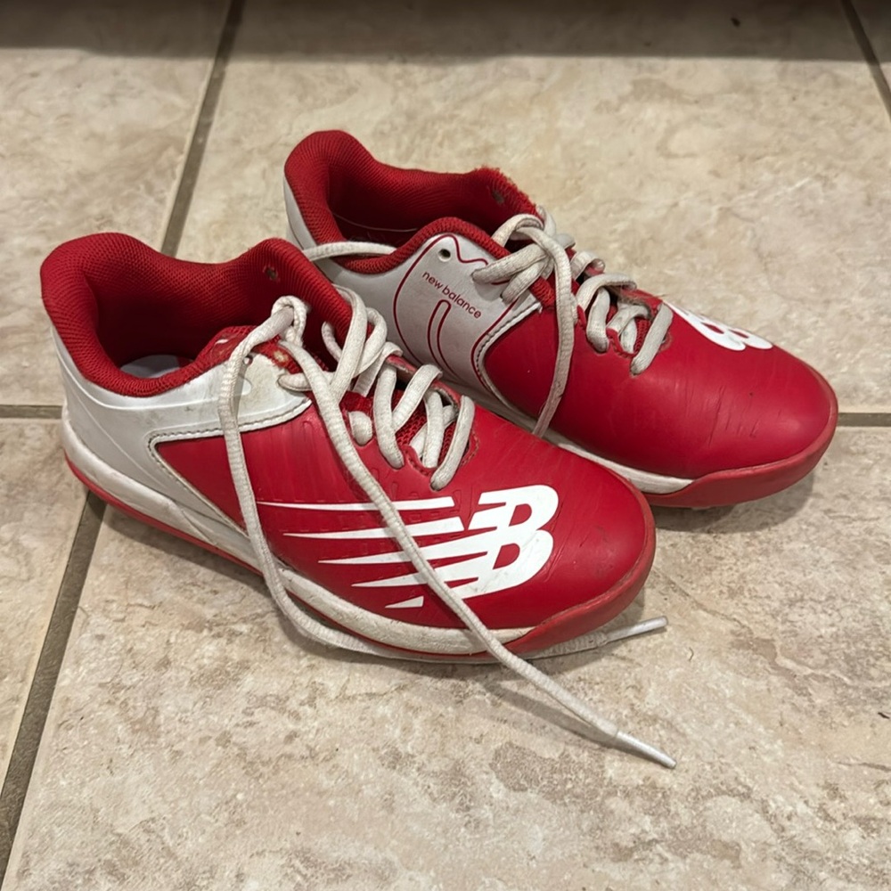 New balance kids cleats. Worn one season. Only on the field. Like new. Size 11.5